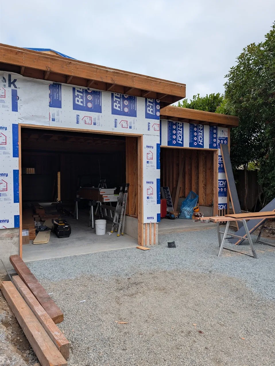 Two framed garage openings with no doors on a Des Moines new build before installation
